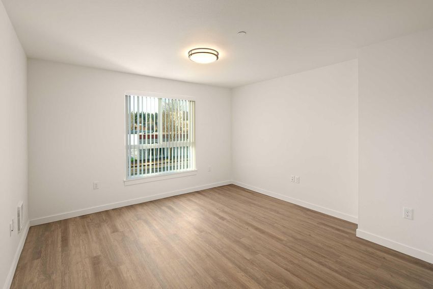 A room photo with two areas marked for new furniture